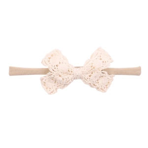 Sweet cream lace bow headband for infants featuring high-elastic nylon and floral texture