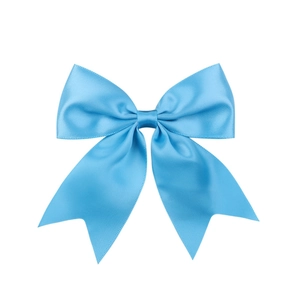 Detail of light blue satin bow hair clip with smooth glossy finish and fine textures