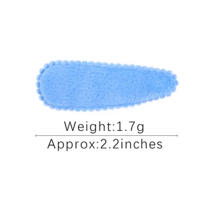 Blue plush BB hair clip for girls featuring wavy edges and 2.2-inch teardrop shape