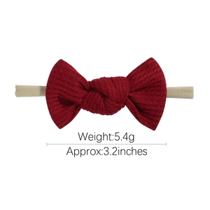 Red waffle texture baby bow headband with 3.2-inch bow and soft 5.4g elastic band
