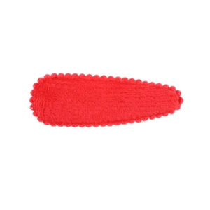 Close-up of a red plush wavy BB hair clip for kids featuring soft faux fur texture