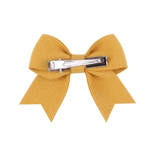 Fermaglio per capelli con fiocco in feltro giallo zenzero e clip a coccodrillo in metallo