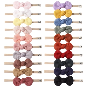 Detail of 20 color options for baby waffle knit headbands with elastic nylon bands