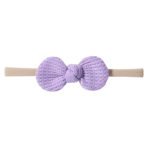 Detail of lavender waffle knit baby bow headband with soft nylon elastic band