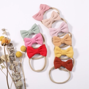 Lot de 10 bandeaux pour bébé avec nœuds en velours côtelé et bandes élastiques en nylon doux