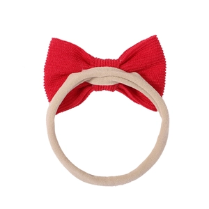 Bandeau bébé avec nœud en velours côtelé rouge et ruban en nylon élastique