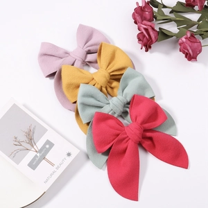 Solid satin bow hair clips set in lilac, yellow, green and red colors for women