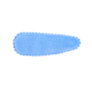 Macro detail of a soft light blue plush BB hair clip with decorative wavy scalloped edges