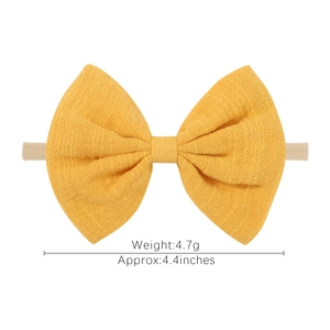 Ginger yellow cotton linen bow headband for babies with elastic nylon band and soft texture