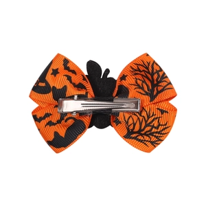 Halloween orange hair bow clip with black cat and tree patterns on a metal duckbill base