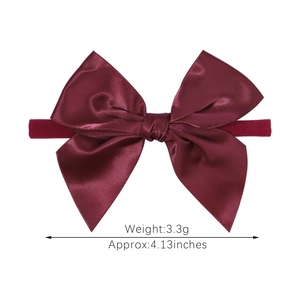 Dark red satin bow nylon headband for babies with soft elastic band on white background