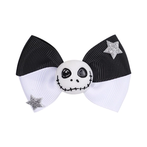 Detail of Jack Skellington bow hair clip with white stars for Halloween party