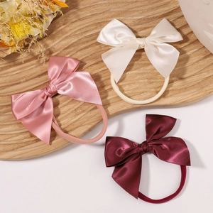 Minimalist soft nylon baby headband set with butterfly bows in white, pink and deep red