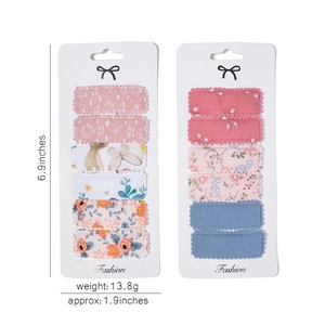 Floral print fabric snap hair clips set for girls featuring 12 pieces in varied patterns