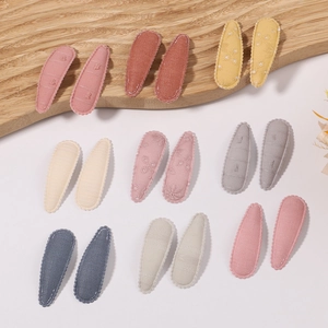 Floral embroidered fabric BB hair clips for kids in various pastel colors and soft cotton texture