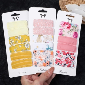 18-piece embroidered fabric snap hair clips set with floral patterns for girls and women
