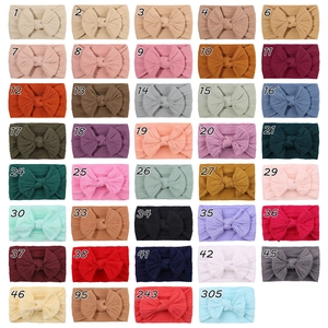 Nuancier détaillé de bandeaux élastiques pour bébés avec nœuds jacquard en 39 coloris