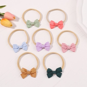 Set of 7 colorful nylon baby headbands with soft ribbed texture bow for toddler girls