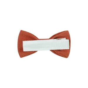 Solid orange linen fabric bow hair clip for children featuring a comfortable metal duckbill clip