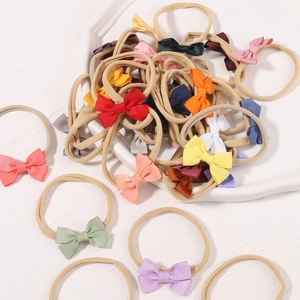 Colorful set of nylon baby headbands with handmade grosgrain ribbon bows for girls