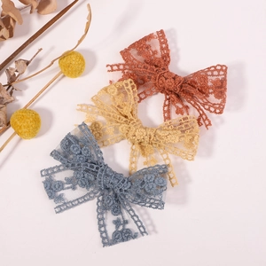 Lace bow hair clips for kids in brick red, soft yellow and grey blue colors