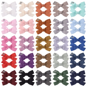 Set of 25 pairs of soft fabric bow hair clips for babies in various vibrant colors