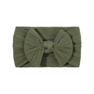 Elastic jacquard baby headband with large knit bow in olive green knit texture