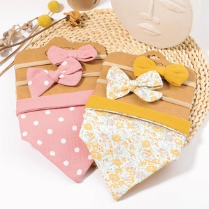 Floral and polka dot baby headband with matching bib set in soft cotton material