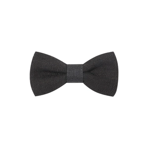 Close-up of black fabric bow hair clip showing detailed woven texture on white background