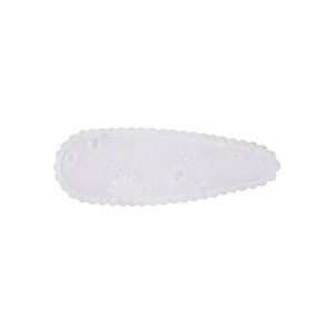 Close-up of white teardrop hair clip with hollow floral embroidery and scalloped edges