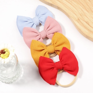 Elastic baby headband set with large fabric bows in four colors for infant girls