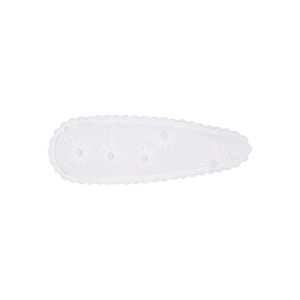 Detail view of a white embroidered fabric snap hair clip with delicate floral patterns