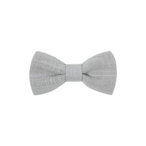 Close-up detail of grey textured fabric bow hair clip with weave pattern