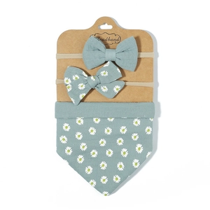 Three-piece baby gift set with daisy print bib and bow headbands on display card