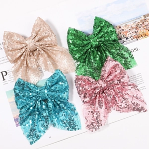 Barrettes à nœuds en résille à paillettes pour filles en quatre couleurs sur magazine