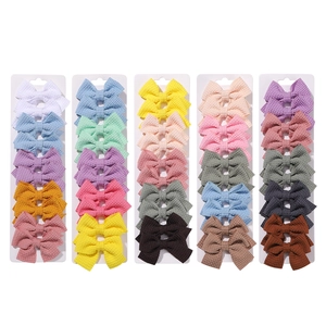 50-piece set of colorful 1.6-inch waffle fabric bow hair clips for girls on display cards
