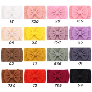 Bandeaux bébé en nylon jacquard doux en 16 couleurs variées avec nœud élastique
