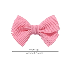 Pink corduroy bow hair clip with vertical stripes for kids, length 2.3 inches