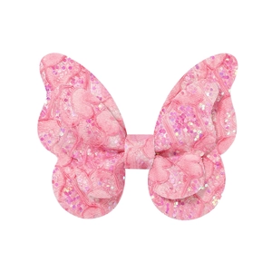 Detailansicht der rosa Spitze Haarklammer mit glitzernden Pailletten und Doppelschleife