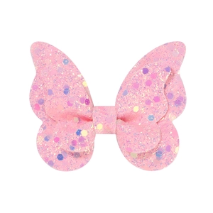 Nahaufnahme der Glitzer-Haarschleife für Mädchen mit rosa Pailletten und Funkel-Effekt