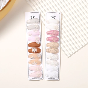 Set of 20 floral embroidery fabric BB hair clips displayed on two white cards