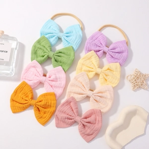 Set aus 8 bunten Baby-Stirnbändern mit elastischen Nylonbändern und Schleifen aus Stoff