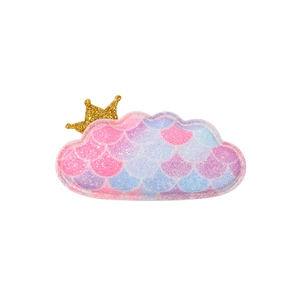 Close-up of cloud-shaped children hair clip with golden crown and glitter sequins