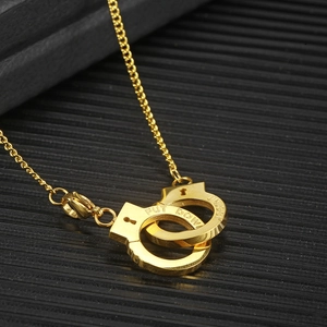 Retro golden handcuffs necklace with PUT DOWN engraving on a minimalist chain