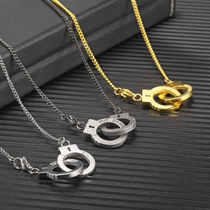 Retro handcuffs necklace with PUT DOWN engraving in gold, silver, and grey finish
