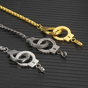 Retro stainless steel handcuff bracelets in gold and silver with PUT DOWN engraving