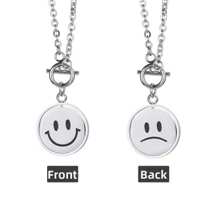 Detail showing rotatable double-sided smiley and sad face pendant with OT buckle closure