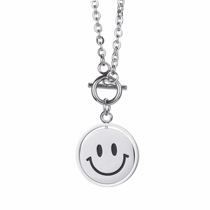 Polished stainless steel smiley face necklace with decorative T-bar clasp on white background