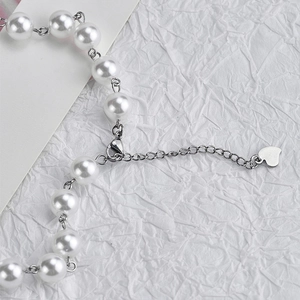 Elegant white pearl heart pendant necklace with titanium steel link and adjustable lobster clasp