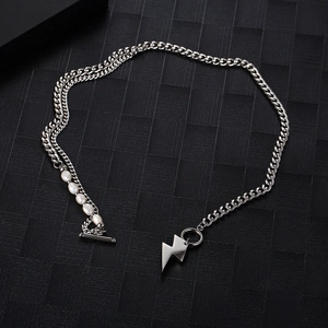 Minimalist pearl necklace with titanium steel chain and lightning bolt pendant detail